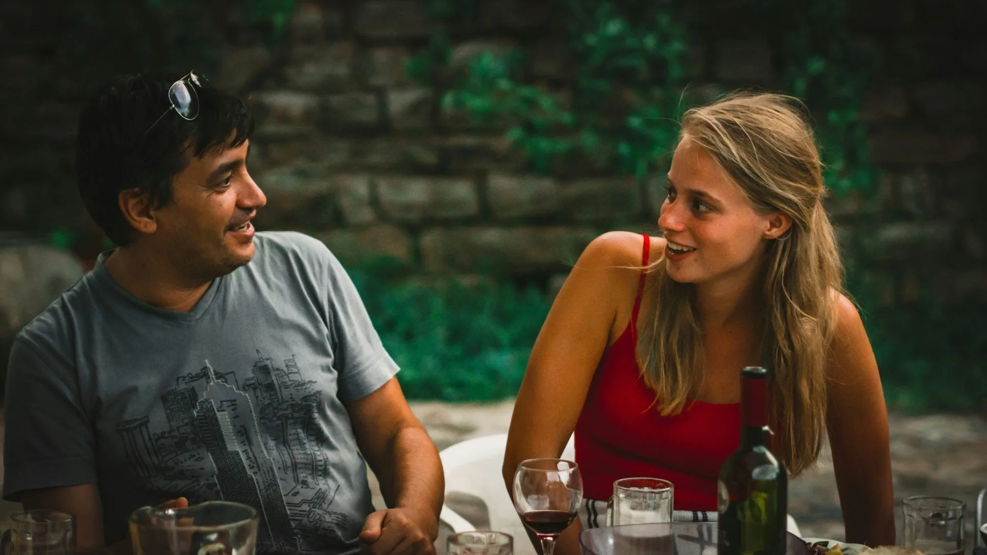 Couple having a thoughtful conversation outdoors